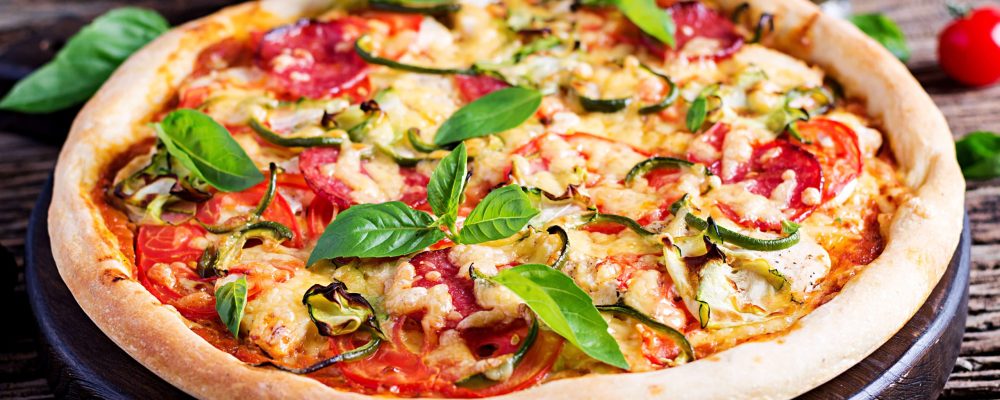 italian-pizza-with-chicken-salami-zucchini-tomatoes-herbs